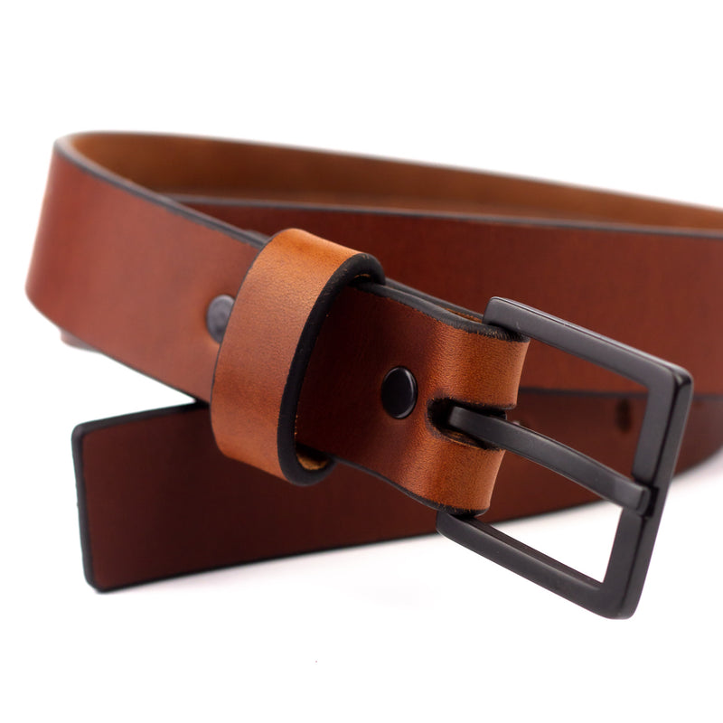 Brown leather belt with metal buckle