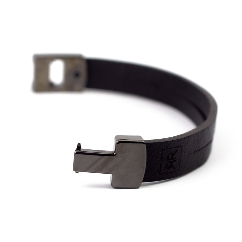 Black skin bracelet with metal magnet fittings