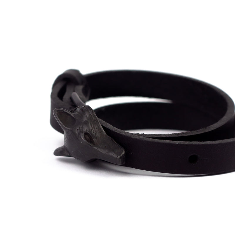 Black skin bracelet with black wolf